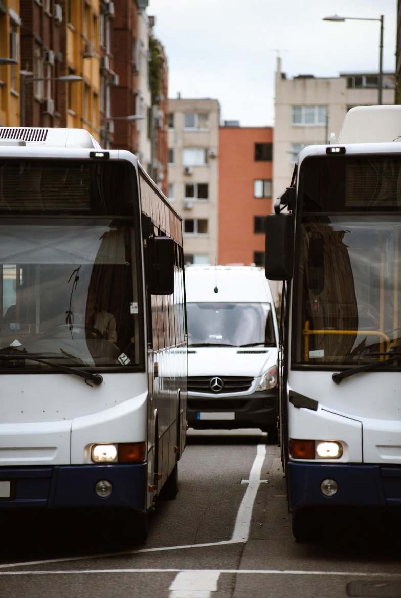 Driving Around Buses and Pedestrians in the City